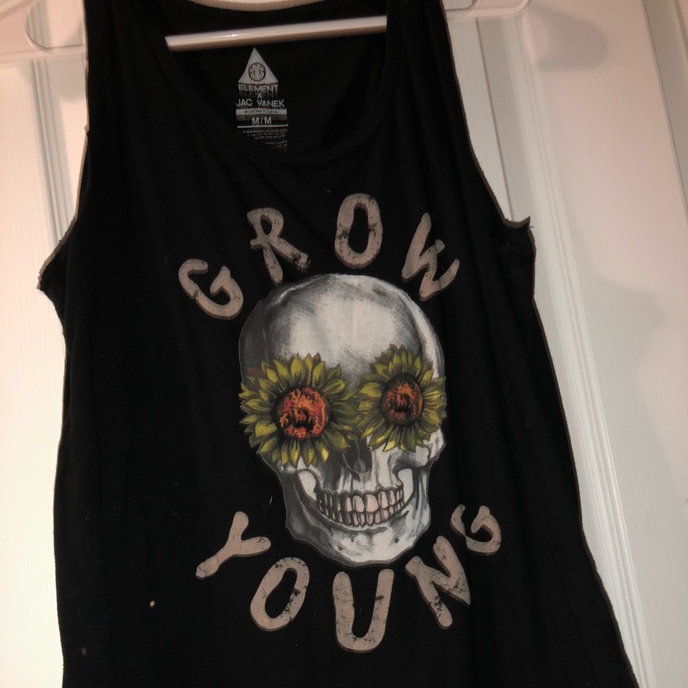 Element tank top w written “grow young”